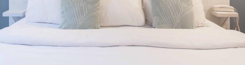 Literie hôtel, fournisseur matelas haut de gamme pour l'hôtellerie - Housse  de rangement pour couette et couverture